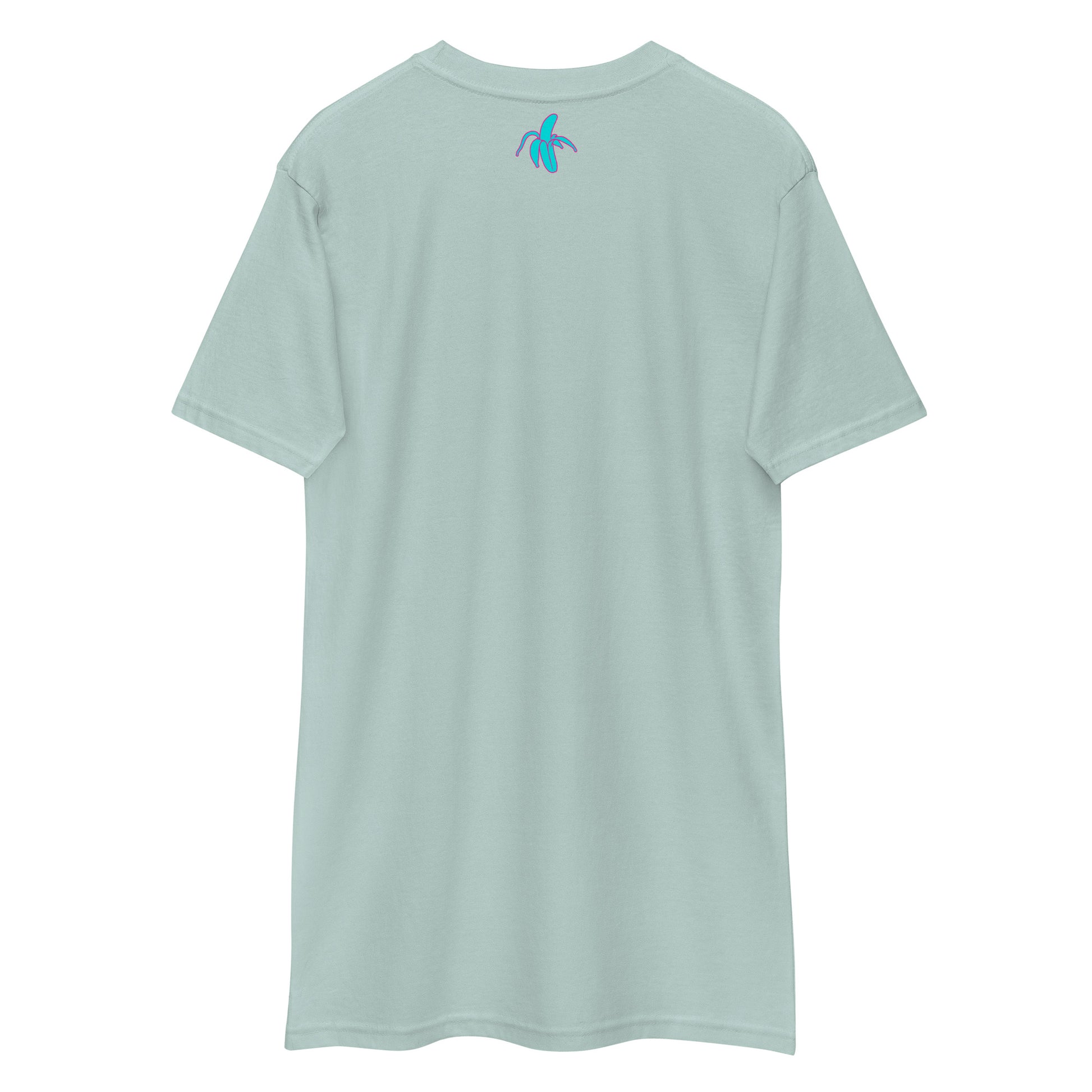 the back of a wrinkled agave Monksee "Drop the Vibe" t-shirt displayed flat against a white background. The Monksee banana is on the back neck teal with a pink border.