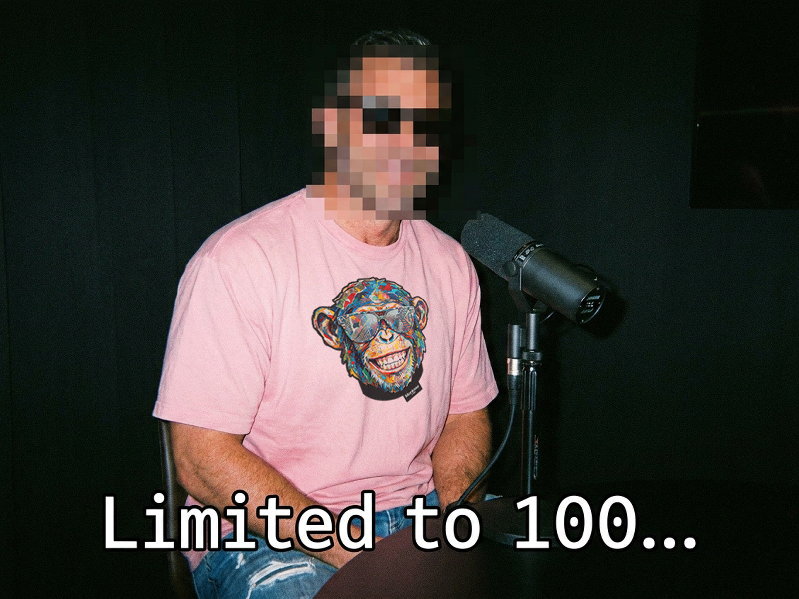 Man being interview with a pixelated face wearing a pink Monksee t-shirt