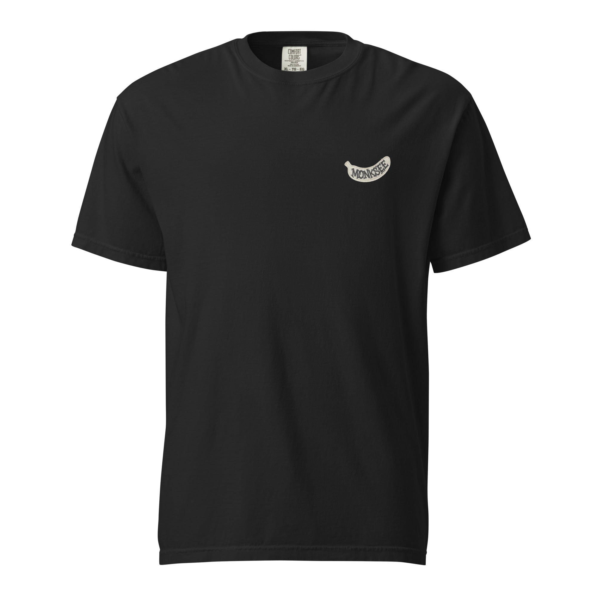 black t-shirt with a white banana shaped Monksee label on the left chest. On a white background