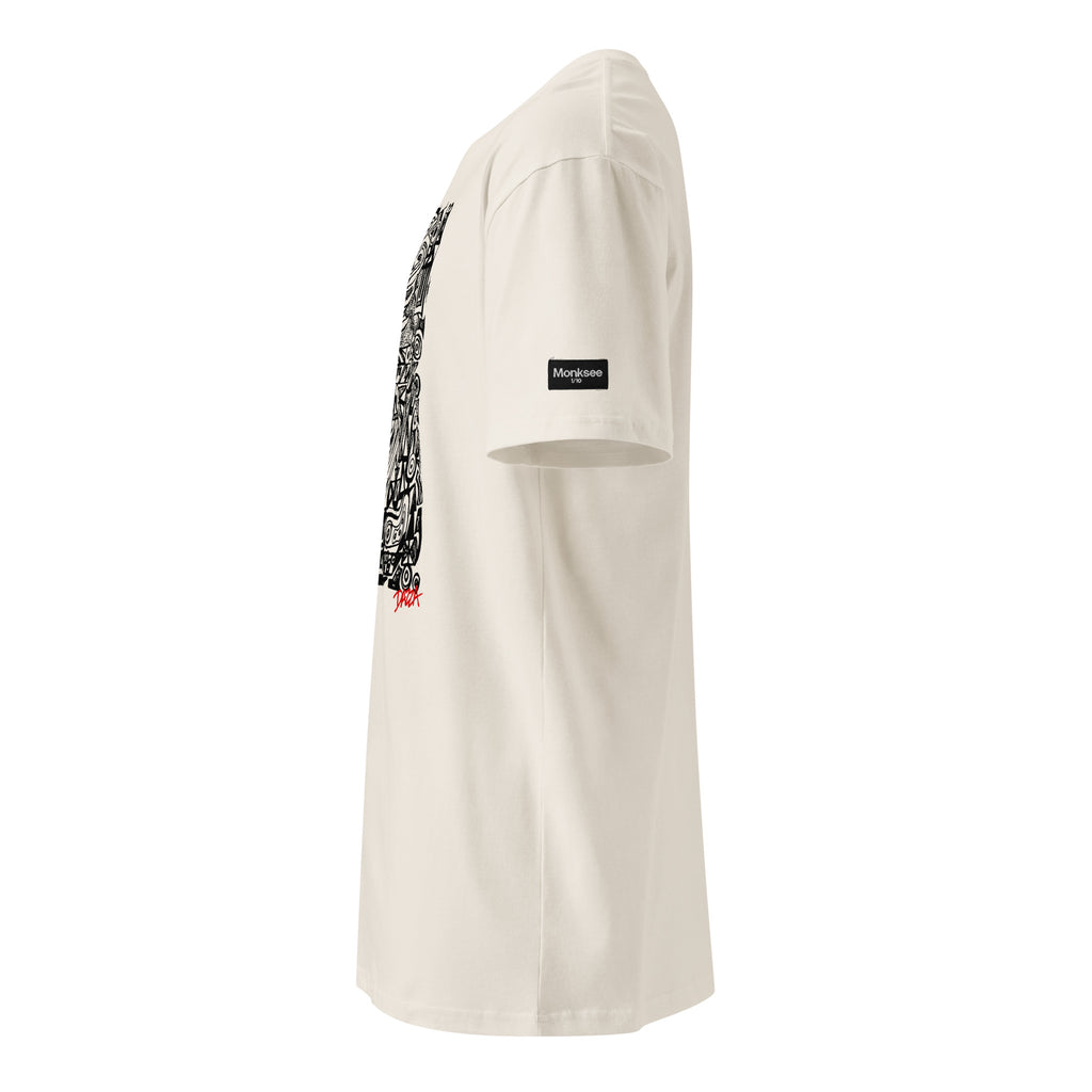 A bone short-sleeve t-shirt shown from a side profile view, featuring a black graphic print on the back and a small Monksee 1 of 10 label on the sleeve.