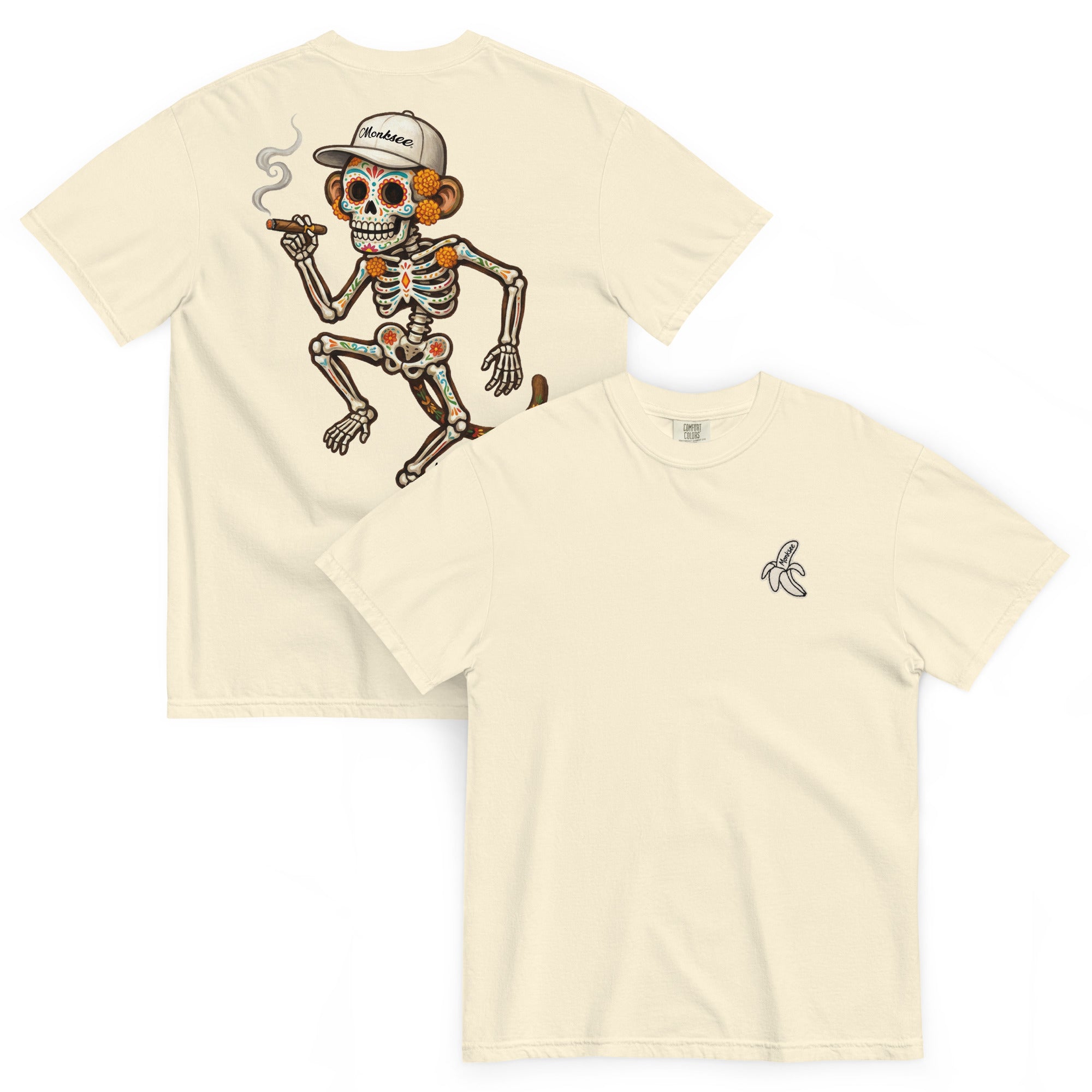 Two ivory-colored t-shirts shown on a white background, displaying the front and back designs. The back shirt features a large graphic of a cartoon skeleton with orange-brown bones, a white baseball cap, and a cigar.