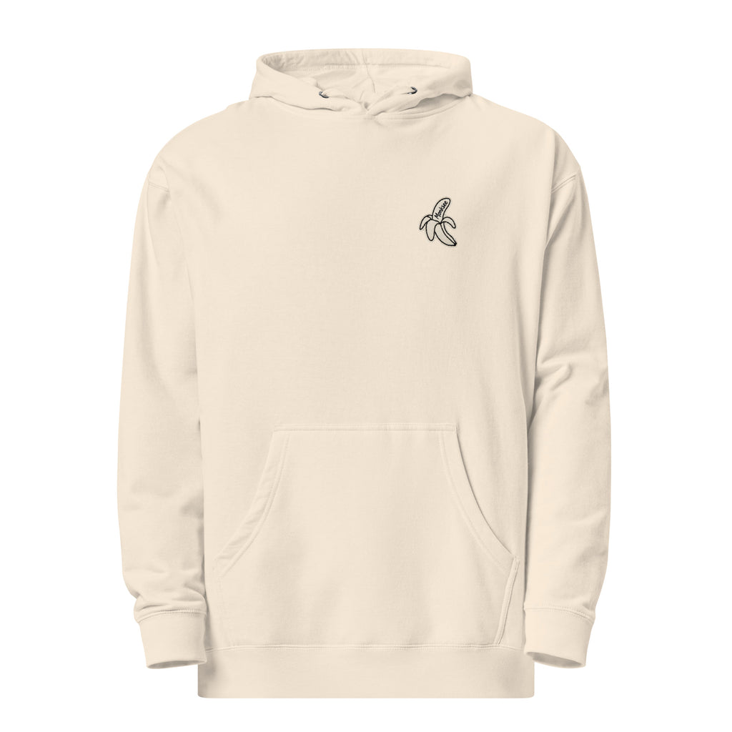 A bone-colored pullover hoodie with a small Monksee banana label on the left chest, displayed on a clean white background.