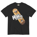 black Monksee kick flip tshirt with skateboard design on the front laying on white background