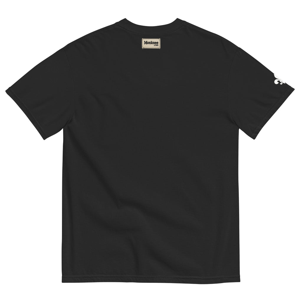 back of black garment dyed t-shirt with Monksee limited edition label on neck line