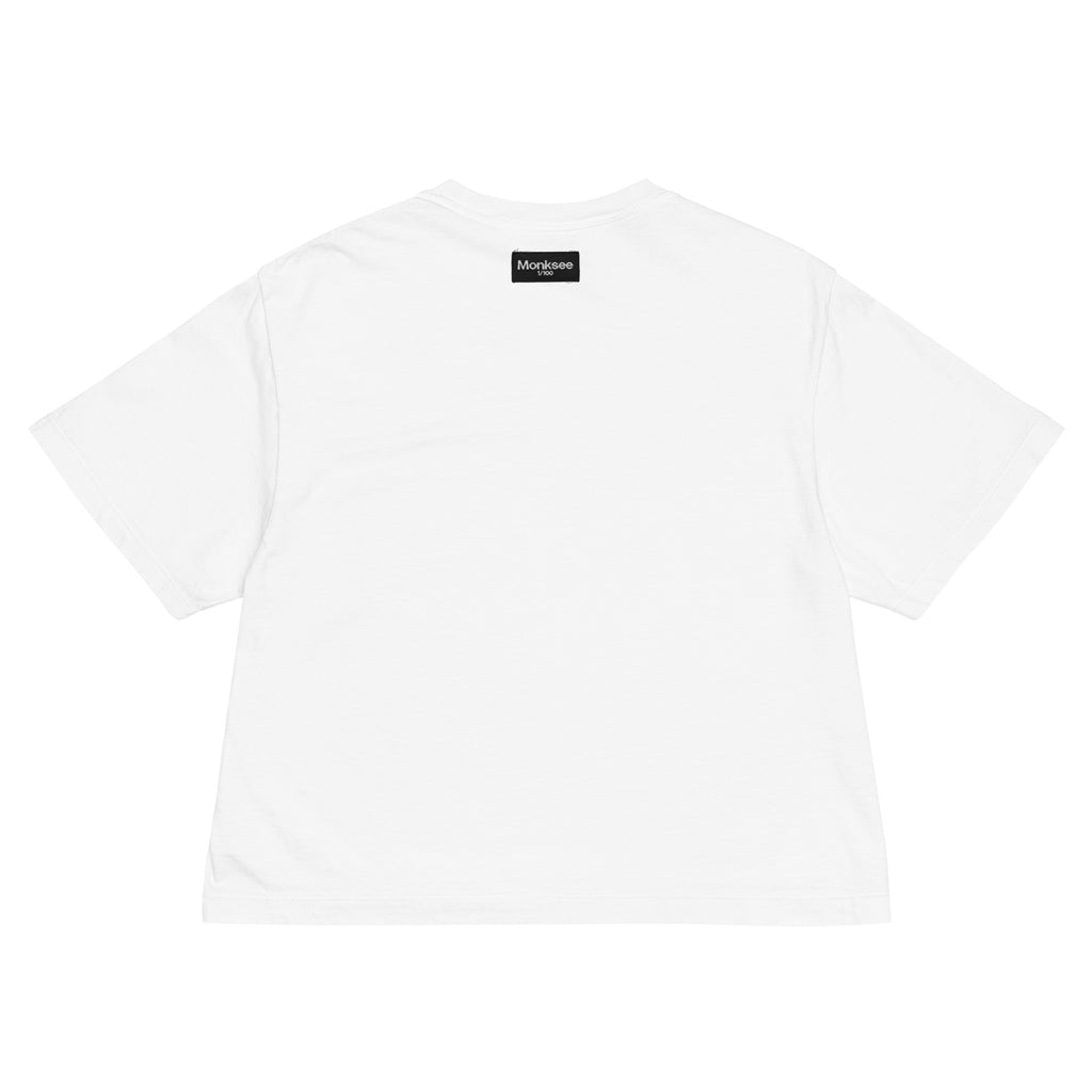 White t-shirt with a black Monksee label on the neck against a white background