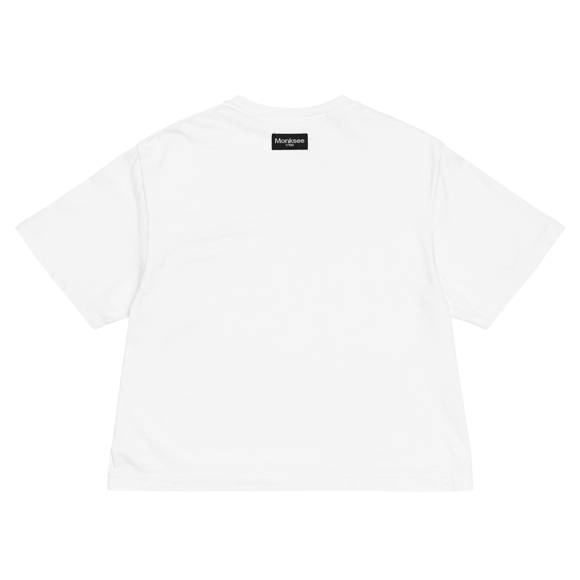 White t-shirt with a black Monksee label on the neck against a white background