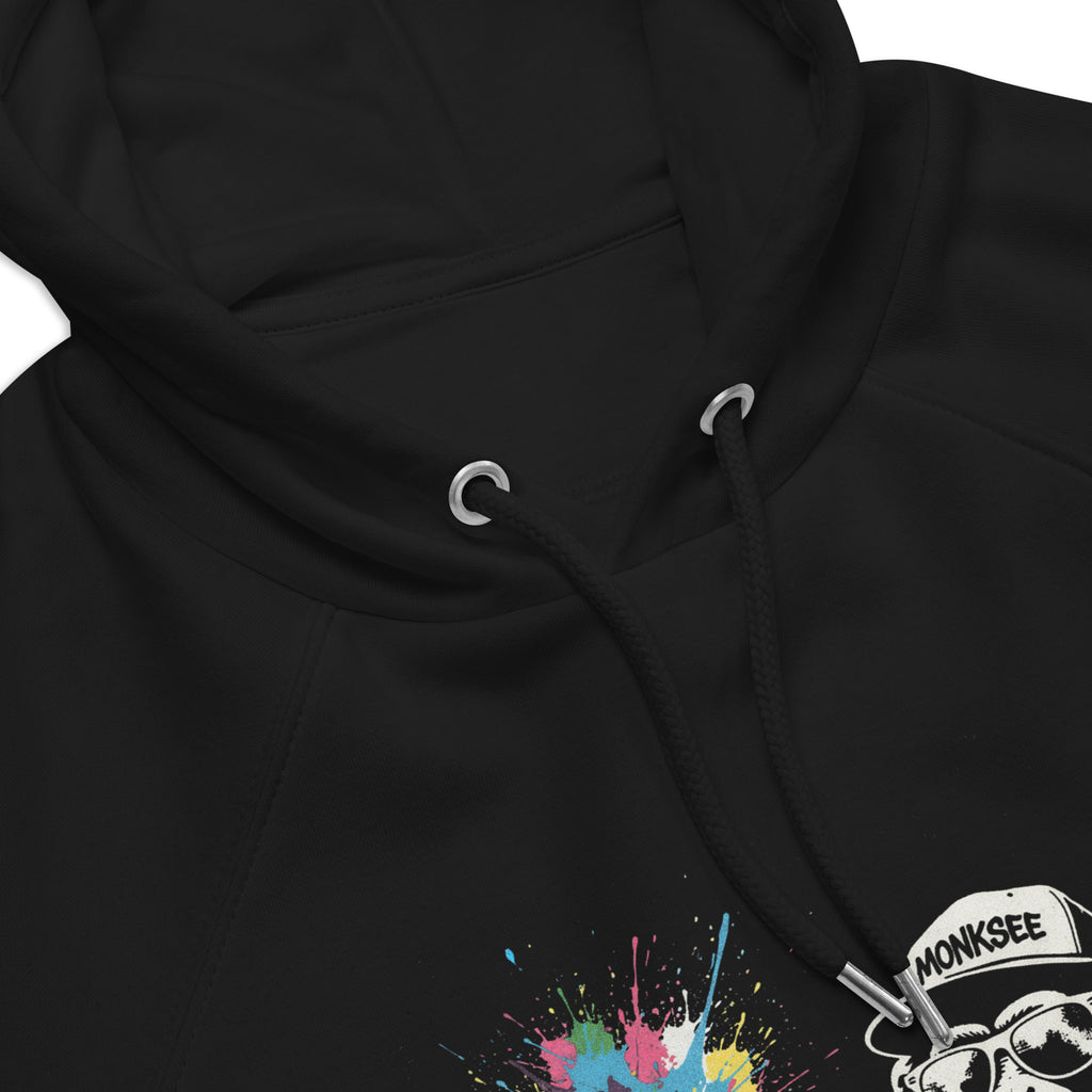 Close up of the neck of Black Monksee hoodie with colorful design on a white background