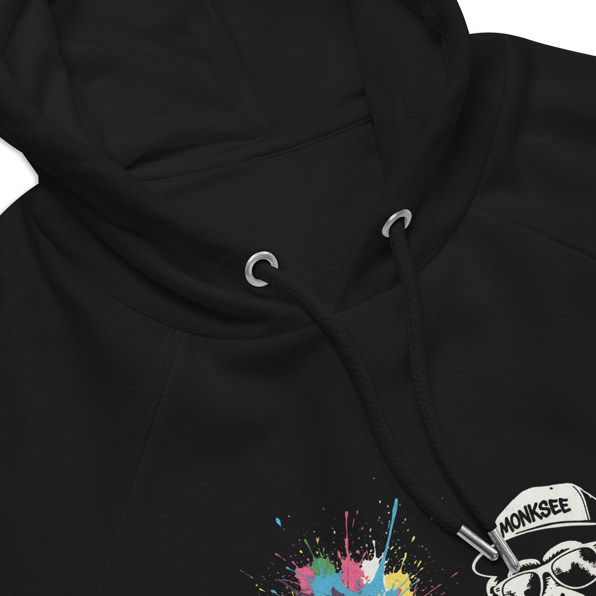 Close up of the neck of Black Monksee hoodie with colorful design on a white background
