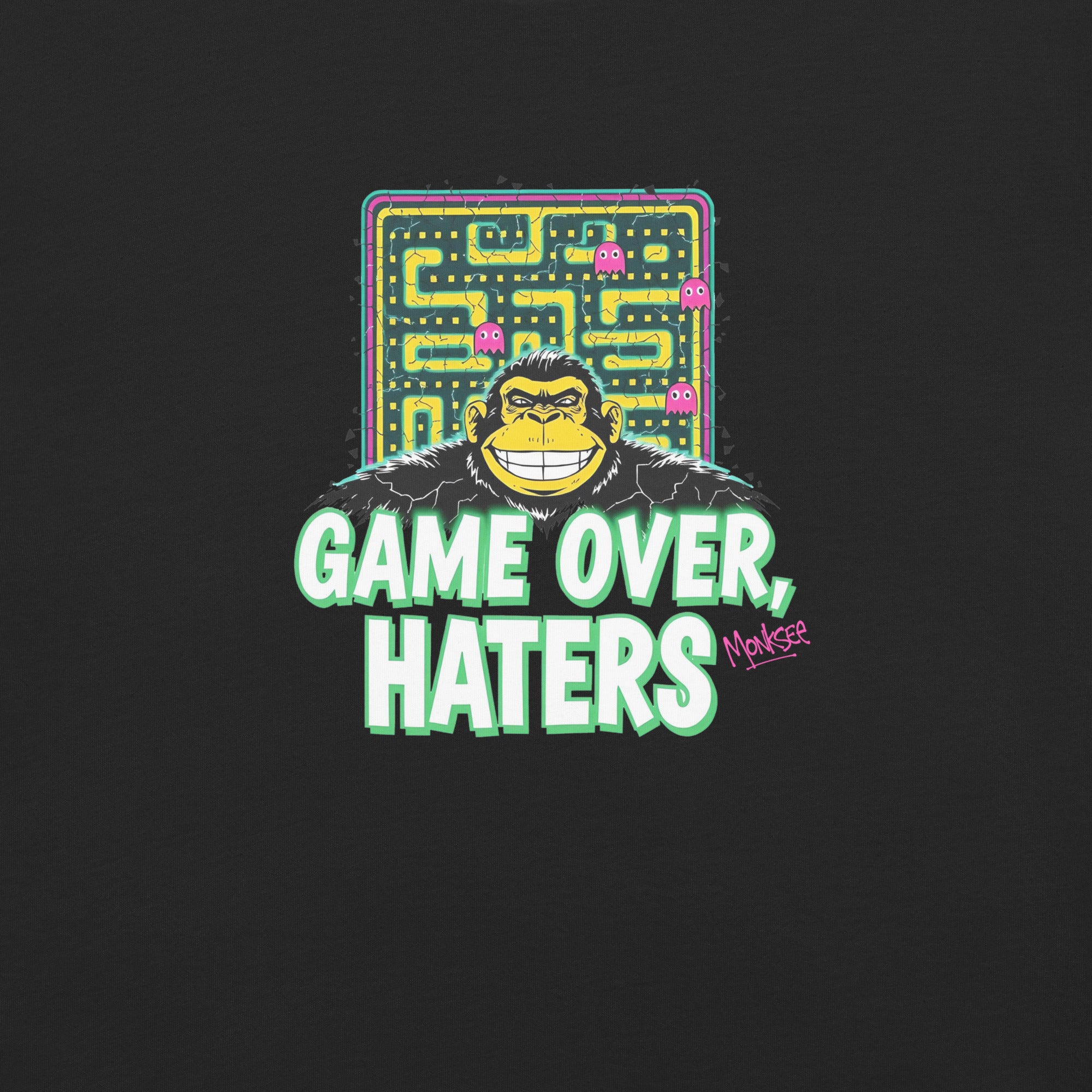 Monksee black garment-dyed T-shirt with Pac-Man-inspired monksee graphic and Game Over Haters text, showcasing a retro 80s design close up of front design