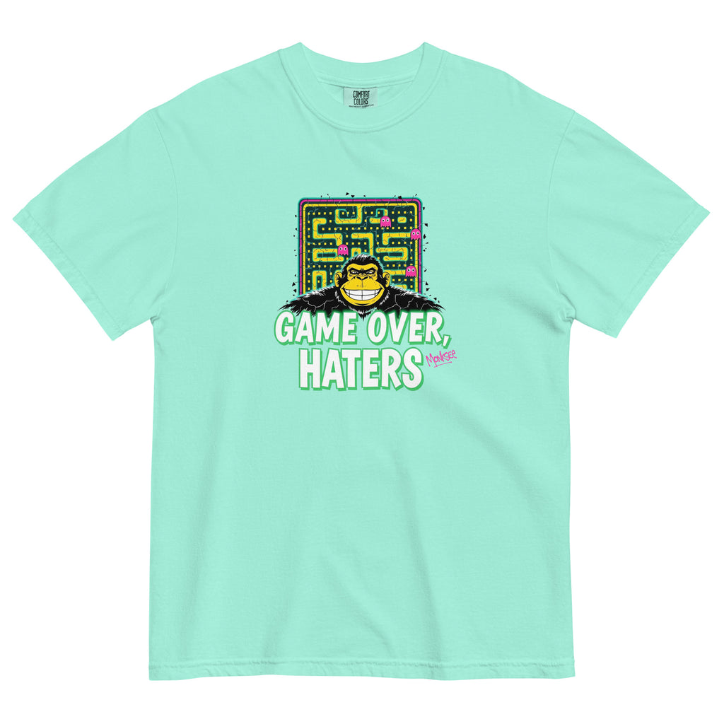 Monksee chalky mint garment-dyed T-shirt with Pac-Man-inspired monksee graphic and Game Over Haters text, showcasing a retro 80s design front laid flat on white background