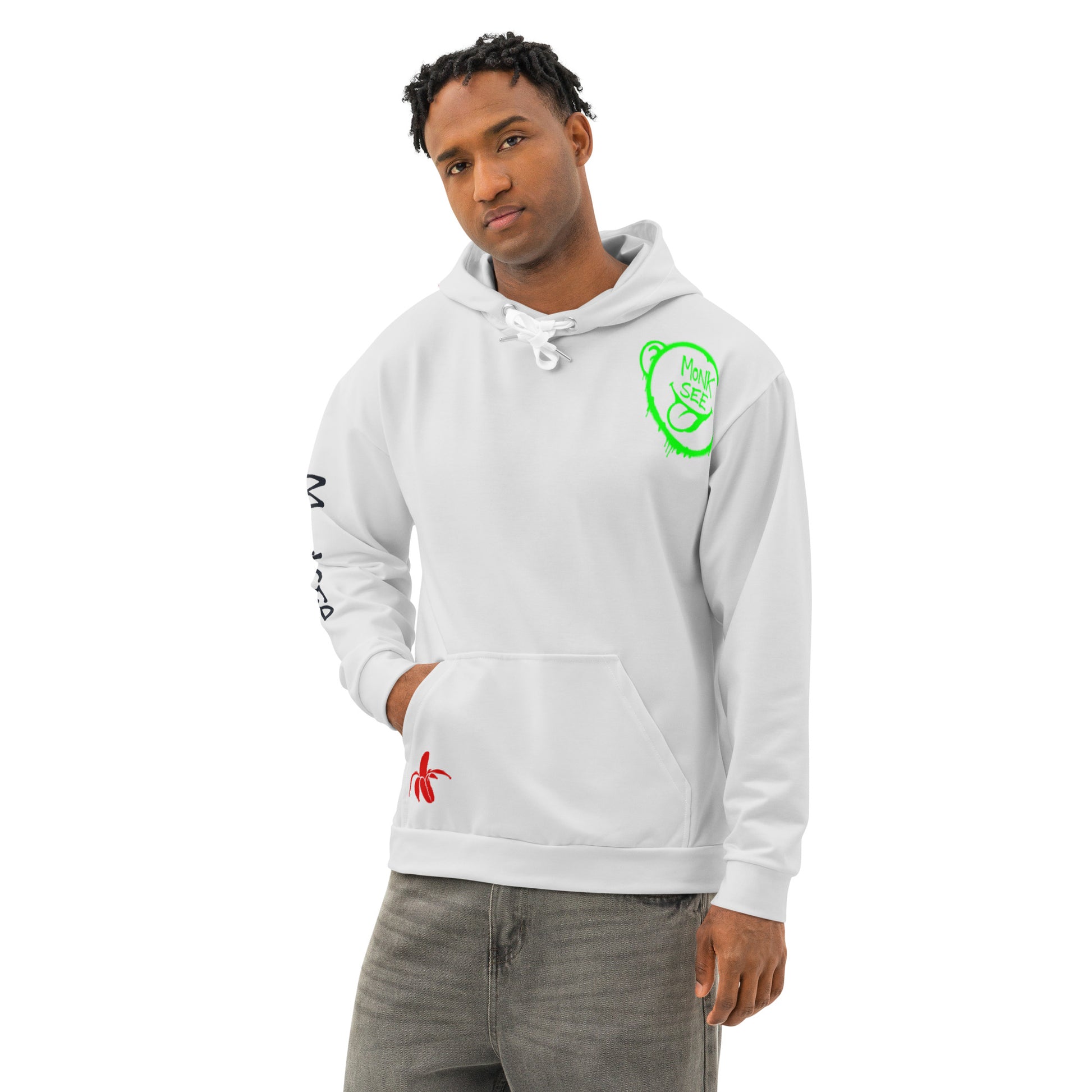 Black Man wearing a chalk Monksee hoodie with green and red graffiti designs on a white background