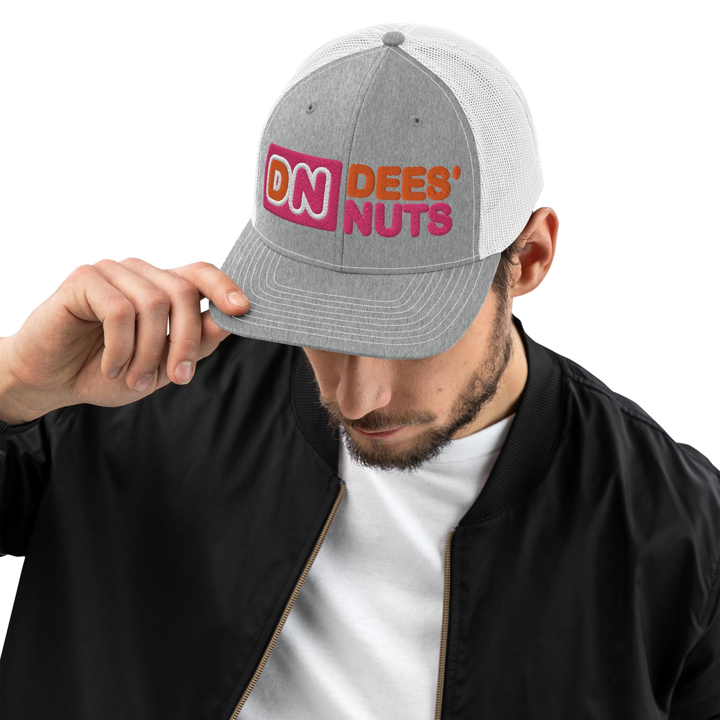 man wearing monksee dees nuts white and grey trucker cap