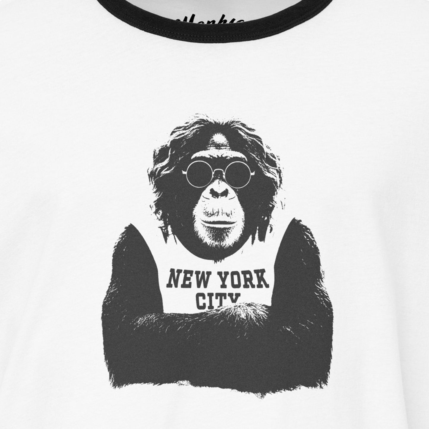 White t-shirt with a graphic of an ape wearing sunglasses and 'New York City' text on a white background.