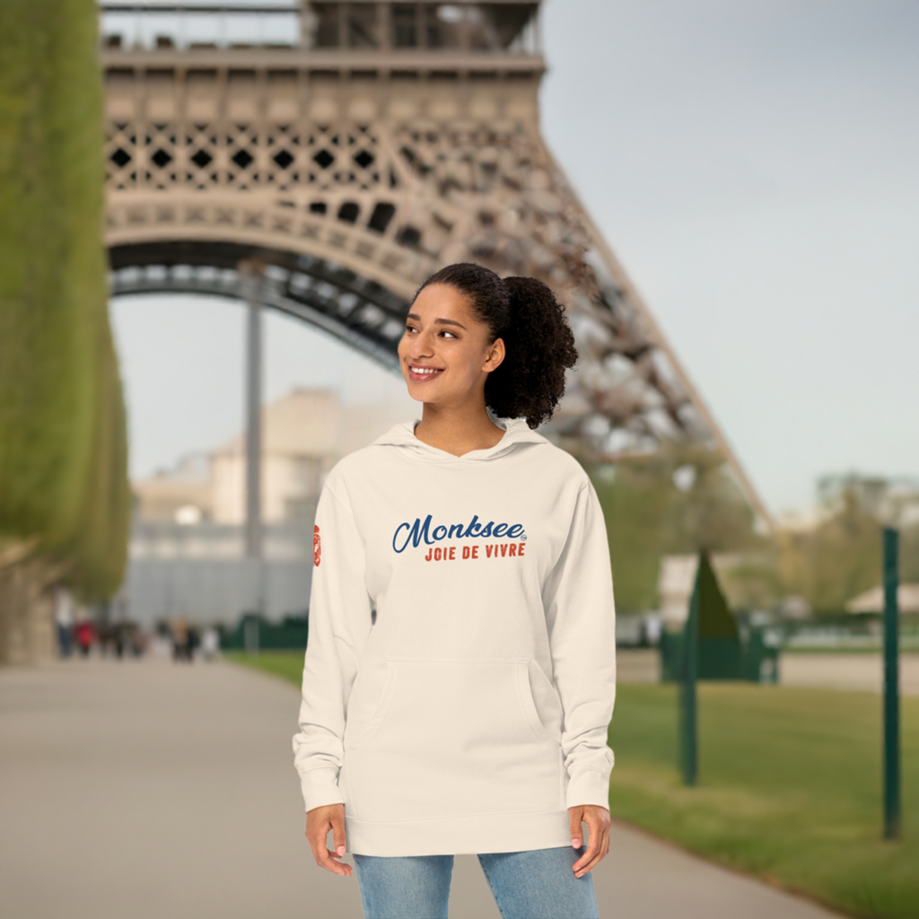 women wearing Monksee joie de vivre white hoodie in front of Eiffel Tower 
