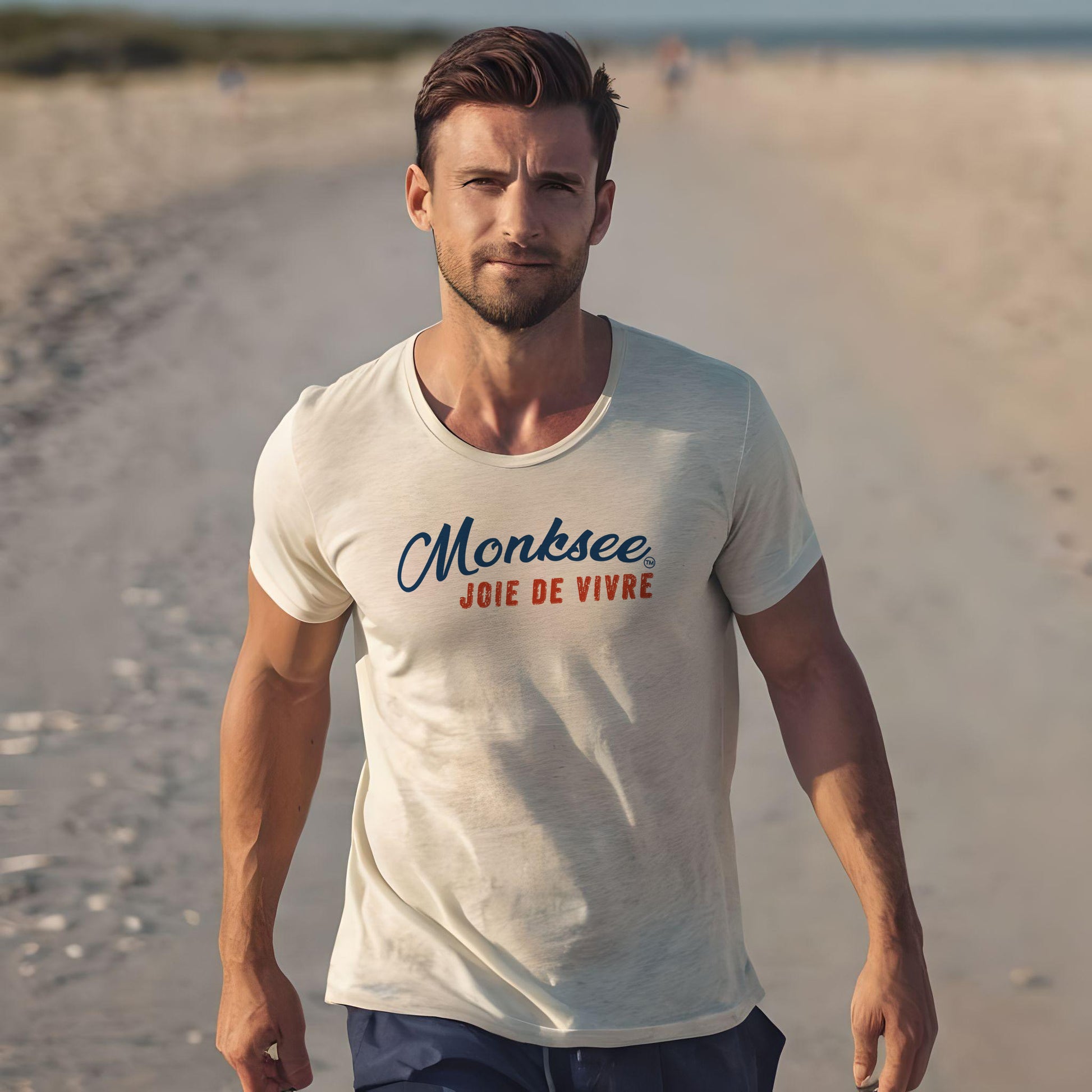 man wearing monksee joie de vivre cotton tshirt on the beach