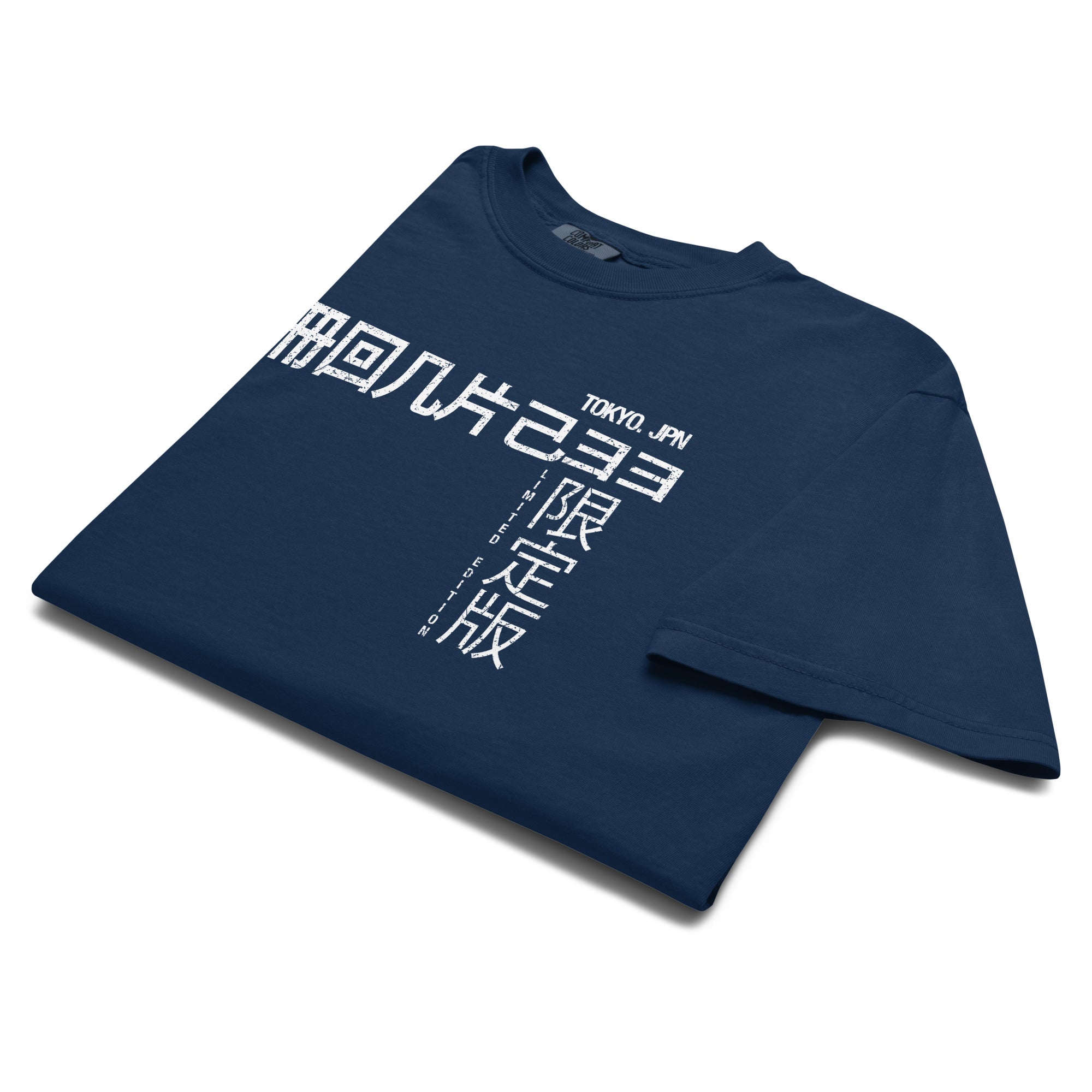 Folded view of the Monksee Tokyo navy garment dyed t-shirt. Laying on a white background