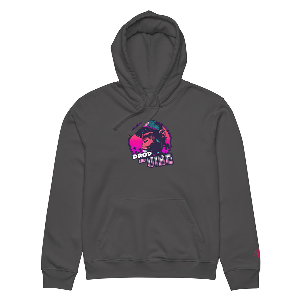 A anthracite Monksee "Drop the Vibe" hoodie up displayed flat against a white background. It features a neon graphic of a cap-wearing monkey against a sunset with palm trees, with "DROP the VIBE" in bold pink and white text. A small pink embroidered Monksee banana logo is on the left sleeve
