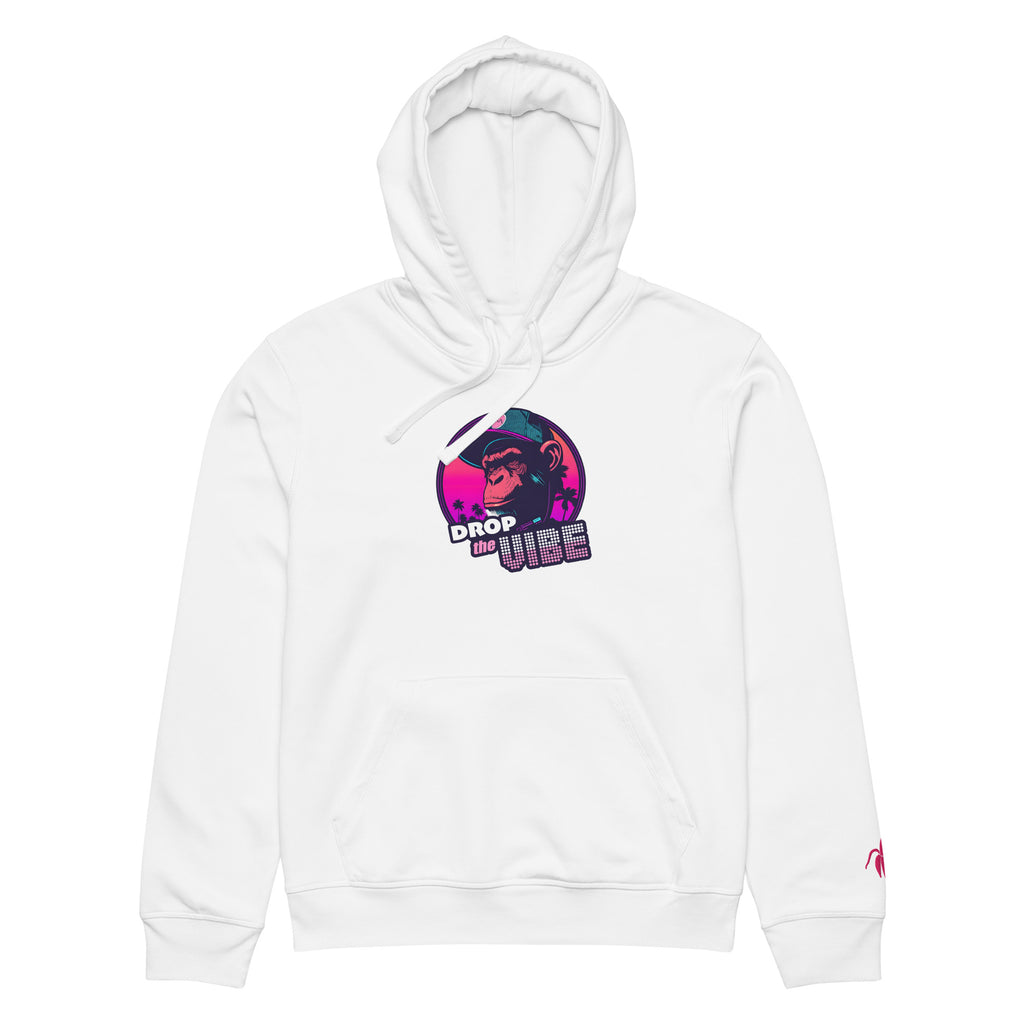 A white Monksee "Drop the Vibe" hoodie up displayed flat against a white background. It features a neon graphic of a cap-wearing monkey against a sunset with palm trees, with "DROP the VIBE" in bold pink and white text. A small pink embroidered Monksee banana logo is on the left sleeve