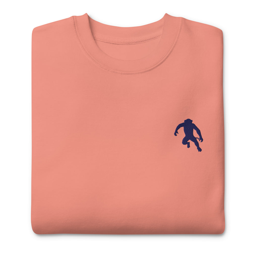 close up of monksee ape shit premium sweatshirt with embroidered design in rose