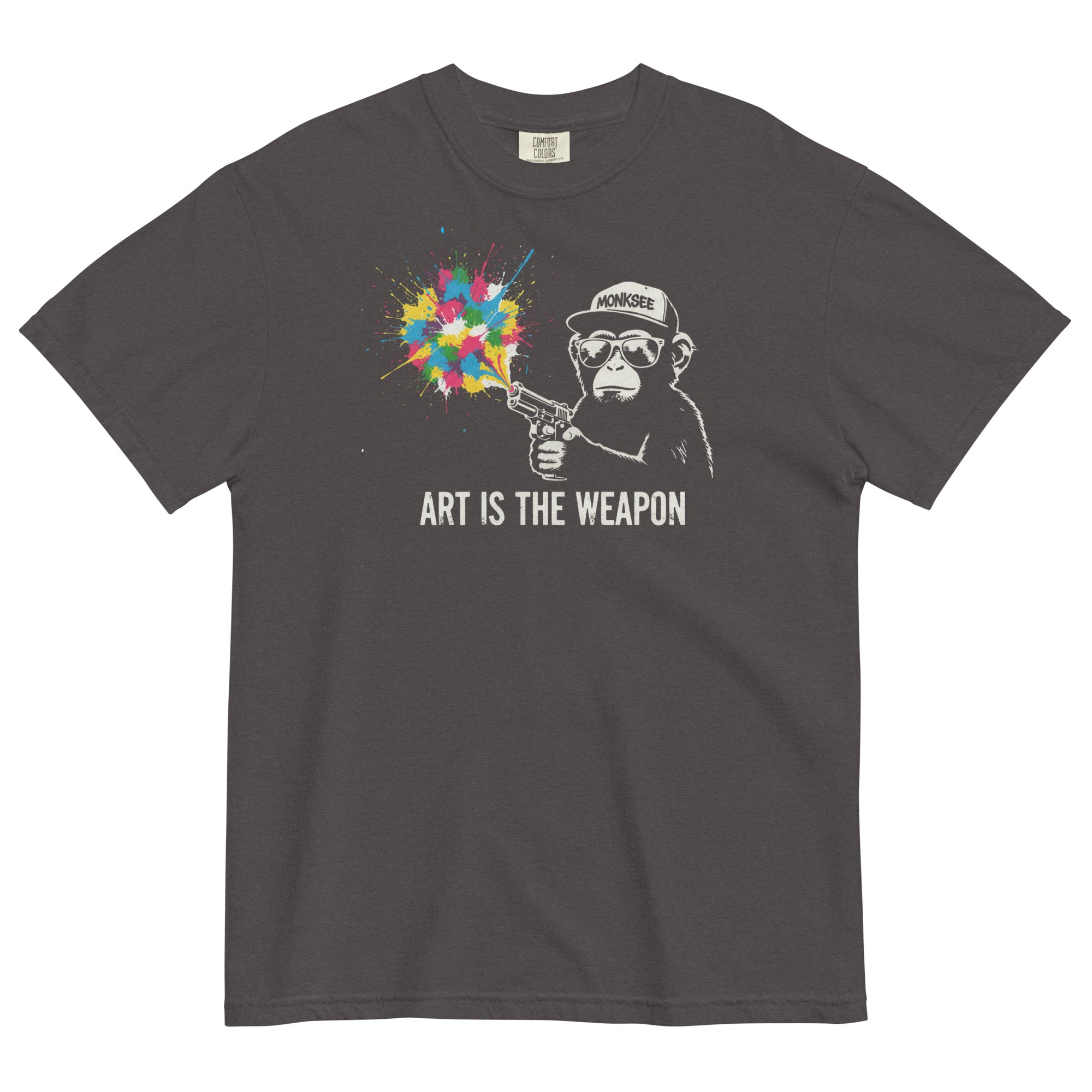 Monksee Graphite t-shirt with a graphic of a monkey holding a gun with colorful paint and 'Art is the Weapon' text on a white background.