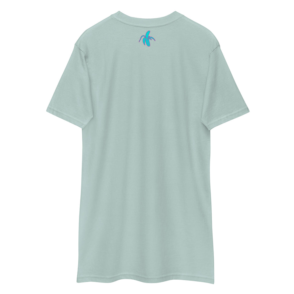 the back of a wrinkled agave Monksee "Drop the Vibe" t-shirt displayed flat against a white background. The Monksee banana is on the back neck teal with a pink border.
