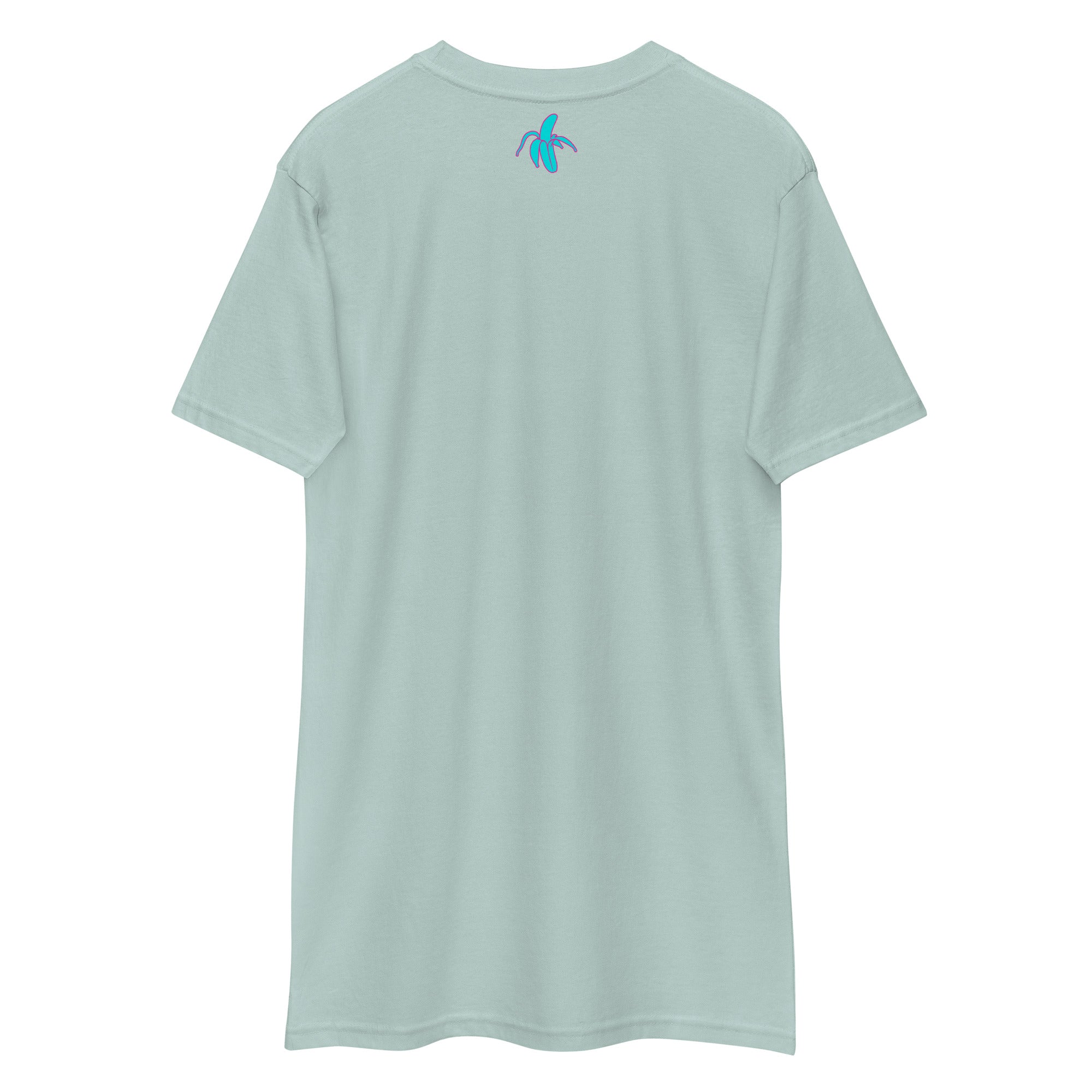 the back of a wrinkled agave Monksee "Drop the Vibe" t-shirt displayed flat against a white background. The Monksee banana is on the back neck teal with a pink border.