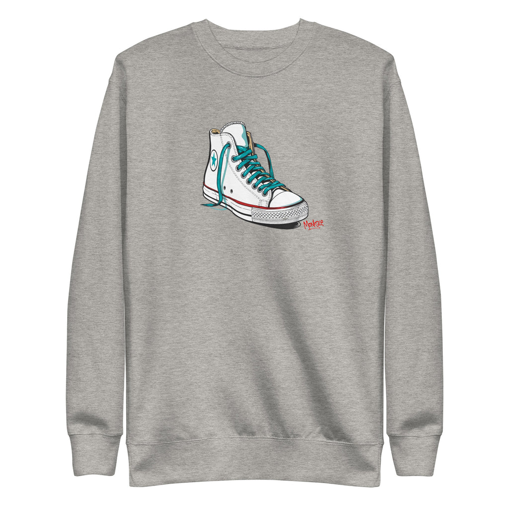 grey monksee kickin it sweatshirt with chuck Taylor all-stars design on the front laying on a white background