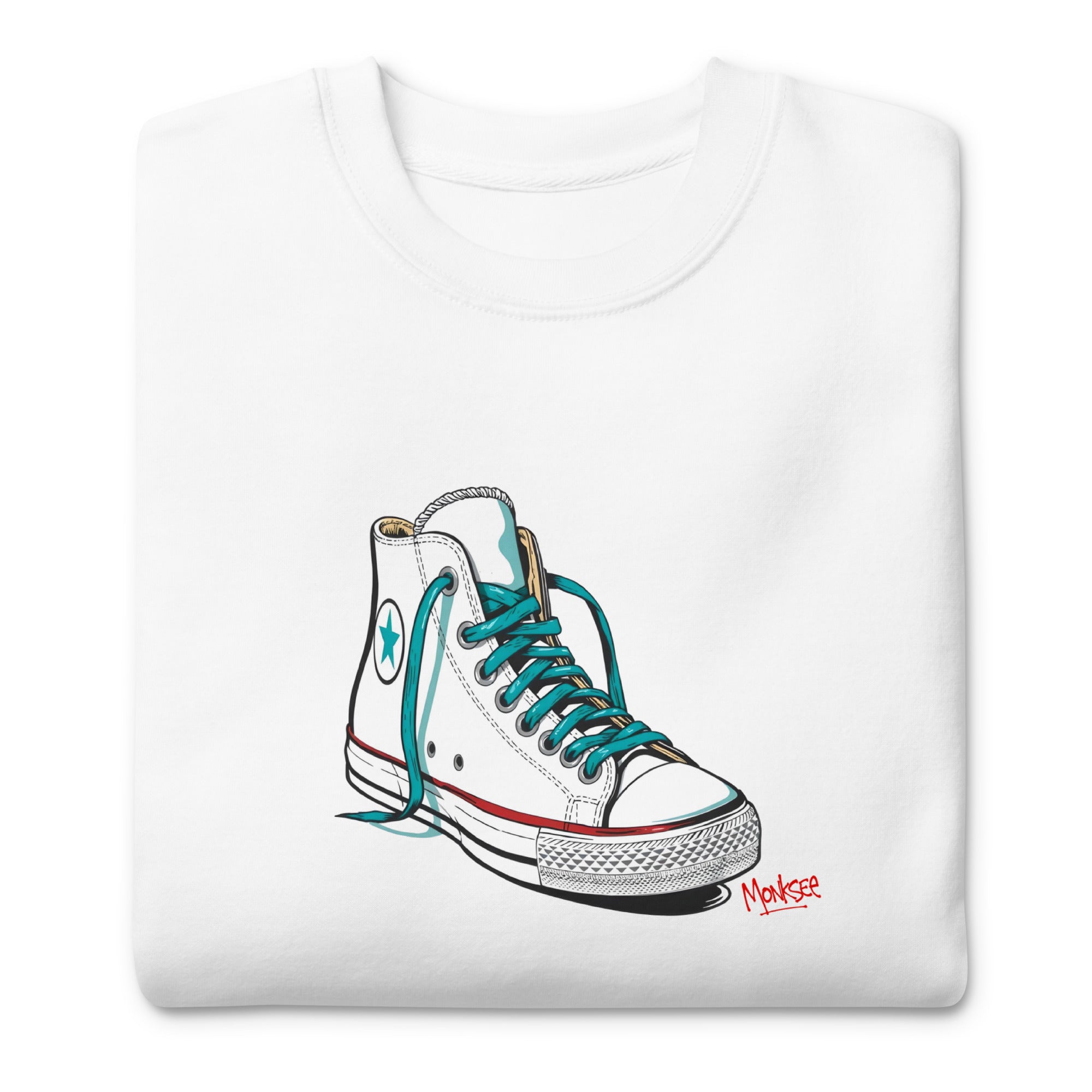 Close up of the design on a folded Monksee Kickin it! unisex premium white sweatshirt. On a white background